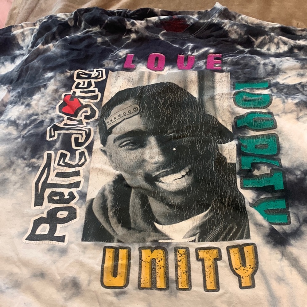 Shirt is for tupac lovers or trendy dress wear